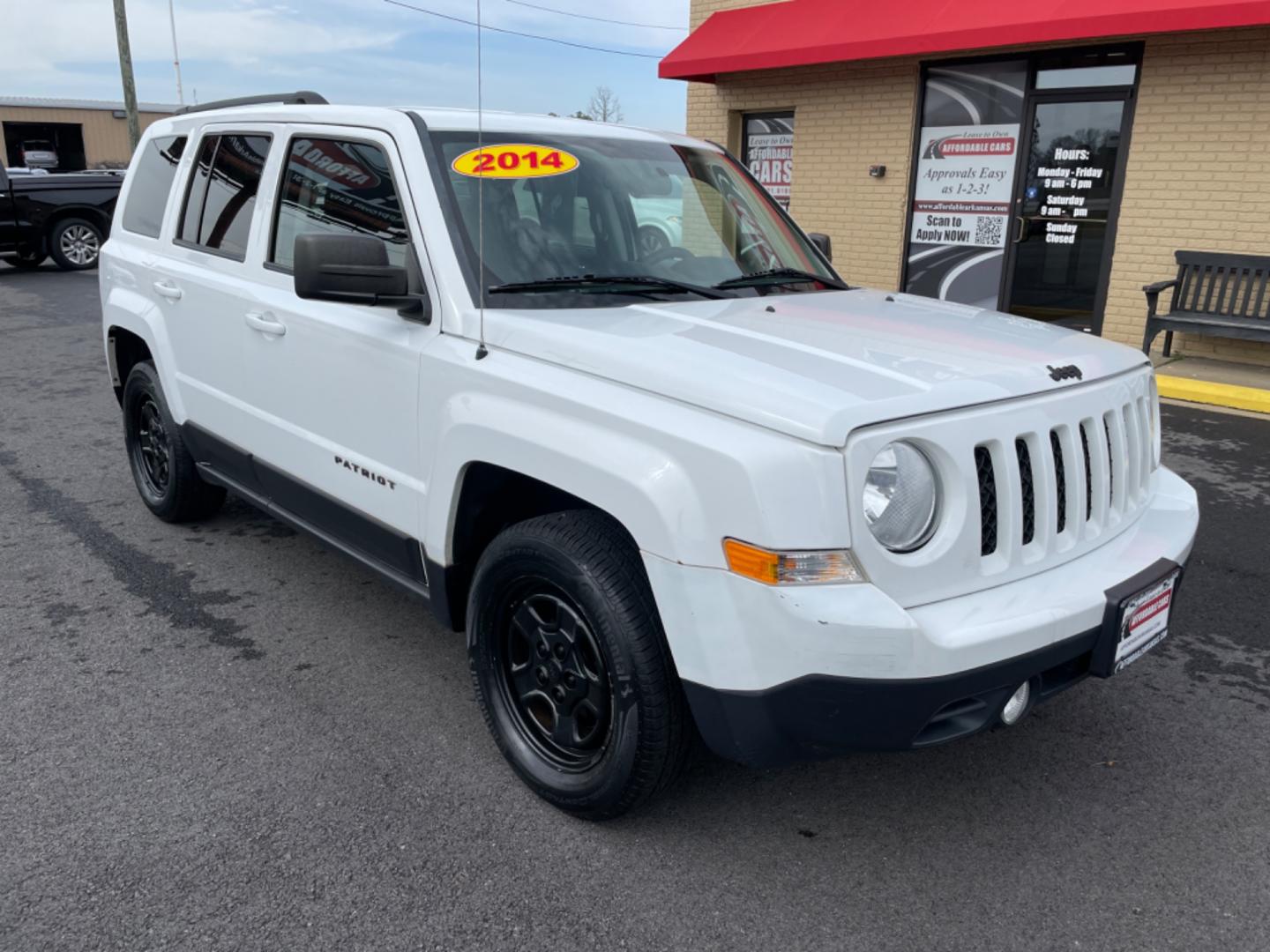 2014 White Jeep Patriot (1C4NJPBAXED) with an 4-Cyl, 2.0 Liter engine, Automatic, 6-Spd w/AutoStick transmission, located at 8008 Warden Rd, Sherwood, AR, 72120, (501) 801-6100, 34.830078, -92.186684 - Photo#1